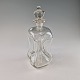 Den ikoniske klukflaske i mundblæst klart glas og med glasprop formet som en krone.Producent ...