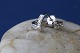 Beautiful earrings in 14 carat white gold, with 3 diamonds and a nice curved shape. The earrings ...