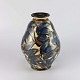 Vase af keramik 
med 
kohornsglasur i 
blå, brun og 
cremefarvet
Producent 
Herman A. 
Kählers ...