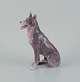 Bing & 
Grøndahl, 
porcelænsfigur 
af stående 
schæferhund.
Modelnummer 
1765.
Design af 
Laurits ...