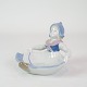 Figur af porcelæn med motiv af siddende pige i uniform, som kan benyttes som lille skål nr. ...