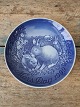B&G Mother's 
Day plate from 
1999
Factory first 
Motif: Rabbit 
with cubs 
Diameter 14.8 
cm.