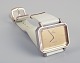 Omega De Ville. Armbåndsur med hvid læderrem.Ca. 1980.Perfekt stand.Uret går.Mål: 32 mm.