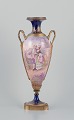 Lucot for Sevres, France. Large amphora-shaped urn in faience and bronze. Sevres 
Bleu decoration with gold accents. Scene Galante. Hand-painted.