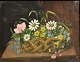Dansk kunstner (19. årh.): Blomster i en kurv på et bord. Olie på lærred. Usigneret. 22 x 27 ...