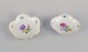 Meissen, 
Tyskland. To 
porcelænsskåle 
håndmalet med 
polykrome 
blomster. 
Guldkant. 
Ca. ...