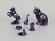 Limoges, Frankrig.  Seks miniature dyr i porcelæn. Dekoreret i 22-karat bladguld og kongeblå ...