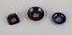 Limoges, Frankrig.  Tre små skåle i porcelæn dekoreret i 22-karat bladguld. Smuk kongeblå ...