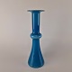 Vase i 
opalhvidt 
mundblæst glas 
med blåt 
overfang. Vasen 
kan også bruges 
som ...