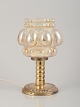 Helena Tynell, 
finsk 
glaskunstner, 
for Limburg.
Designer 
bordlampe i 
klart glas og 
metal.
Mat ...