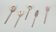 Sigvard 
Bernadotte 
"Scanline" 
brass flatware.
Five pieces of 
serving 
utensils 
consisting of 
one ...