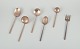 Sigvard 
Bernadotte 
"Scanline" 
brass flatware. 
 
Six pieces of 
serving 
utensils 
consisting of 
...