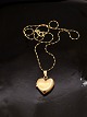 14 carat gold medallion heart