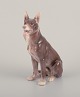 Bing & 
Grøndahl, 
porcelænsfigur 
af stående 
schæferhund.
Modelnummer 
1765.
Design af 
Laurits ...