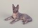 Dahl Jensen, 
porcelænsfigur 
af liggende 
schæferhund.
Model 1130.
Ca. 1930.
Stemplet.
Første ...