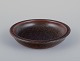 Saxbo. Unique ceramic bowl. Glazed in brown tones.