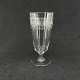 Height 16 cm.
The glass 
appears in 
Holmegaard's 
catalog from 
1900 as "Toddy 
glass No. 133". 
...