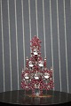 Decorative, old Christmas tree in metal decorated with rhinestones and crystals 
in glass from Bohemia. H: 13,5cm.