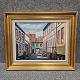 Maleri på 
lærred med 
motiv af huse 
og en gade
Hjelmerstald i 
Aalborg
Kunster for os 
...