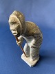 Soapstone figure shaped like a man, Greenlandic stone art.