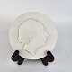 Platte af hvidt 
porcelæn med et 
portræt af H. 
C. Andersen 
1805-1875
Producent 
Royal ...