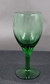 Kirsten Piil 
glas fra 
Holmegård. 
Grønt 
rhinskvin eller 
hvidvin glas i 
fin stand.
H 12,5cm - Ø 
...