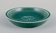 Saxbo, Denmark. Small ceramic bowl featuring a motif of a standing bear.Glaze in green ...