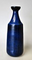 Nylund, Gunnar 
(1904 - 1989) 
Sverige: Vase. 
Model: 5066. 
Stentøj. Blå 
glasur. 
Udarbejdet af 
...