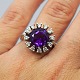 Hvidguldsring i 
14 kt. prydet 
med stor 
ametyst og 
diamanter, i 
alt ca. 0,36 
ct. Ring str. 
...