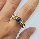 Ring i 18 kt. 
guld med safir 
og diamanter