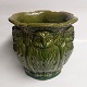 Søholm 
keramikfabrik: 
Grøn glaseret 
urtepotteskjuler 
med dekoration 
af ugler rundt 
om krukken / 
...