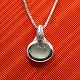 Ole Lynggaard; 
Emely pendant 
in 18k white 
gold set with 
moonstone and 
diamonds. Sold 
without ...