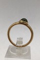 Georg Jensen 
18K Guld Ring 
David Chu 
Moonrise 
Peridot