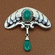 Bernhard Hertz; An Art Nouveau silver brooch with chrysoprase and moonstone