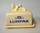 Lurpak Smør 
beholder, 
fajance, 20. 
årh. Stemplet.: 
Made 
ecclusively for 
Lurpak. H. 11 
cm. L: L.: ...