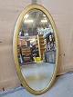Guldmalet ovalt 
spejl, fra 
1920erne.
Det har 
brugsspor.
Højde 102cm 
Bredde 56cm