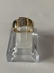 Smuk guldring 
med indlagt 
Diamanter. 
Denne ring kan 
bæres enten 
alene, eller i 
kombination med 
...