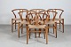 Hans J. Wegner 
(1914-2007)
Sæt på 6 
Y-stole CH 24 
fremstillet af 
let patineret
egetræ med ...