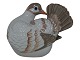 Royal 
Copenhagen 
faiende 
figurine, dove.
Designed by 
artist Jeanne 
Grut.
The factory 
...