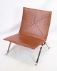 Lænestolen 
PK22, designet 
af Poul 
Kjærholm i 1956 
og fremstillet 
af Fritz 
Hansen. Denne 
ikoniske ...