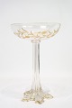 Glas opsats 
dekoreret med 
mønstret guld 
og udformeret 
med en unik 
måde fra 
omkring 
1890'erne. ...