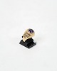 Denne Ring er 
fremstillet af 
14 karat guld 
og udsmykket 
med en flot 
ametyst. Ringen 
er stemplet ...