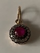 Pendant 14 
carat gold, 
with a red ruby 
&#8203;&#8203;and 
...