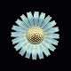 A. Michelsen 
Marguerit / 
Daisy Broche i 
forgyldt 
sterling sølv 
med turkis 
emalje - 43mm.
Udført ...