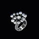 Vilhelm 
Holmstrup. Ring 
i 14k hvidguld 
med månesten og 
0,47 ct 
diamant.
Tegnet og 
udført hos ...