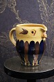 "Lillerod" owl jug in glazed earthenware in fine oak yellow / brown / blue 
glaze...