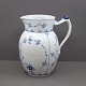 Royal 
Copenhagen,
Blue Fluted 
porcelain;
A Pitcher, 
#450.
Third. L. 16,5 
cm.
Royal ...