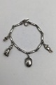 Georg Jensen 
Sterling Sølv 
Armlænke No. 43 
m Charms