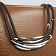 Anette Kræn for Georg Jensen; Halssmykke i læder med ...