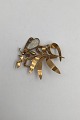 Evald Nielsen 
18K Guld Broche 
med Opal 
Måler 4.9 cm x 
4.9 cm (2.32 
inch x 2.32 
inch) Vægt 11.9 
...